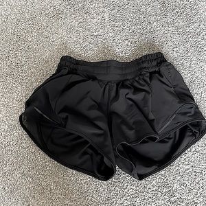 Black Lululemon Hotty Hot shorts. Size 0. 2.5 inch Length